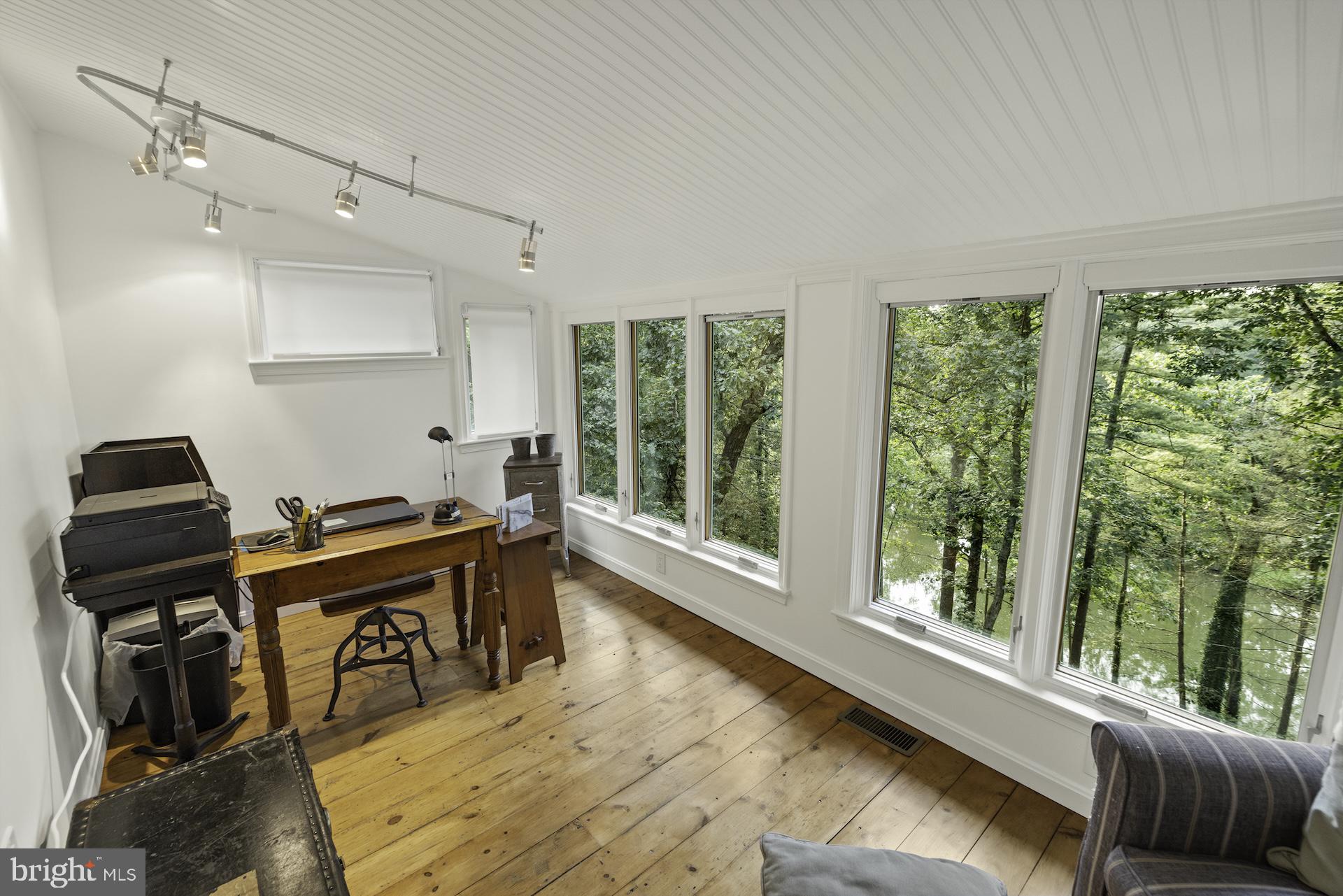 229 Boy Scout Road New Oxford, PA 17350 - Photo 22 of 73 a view of a workspace with furniture and a window