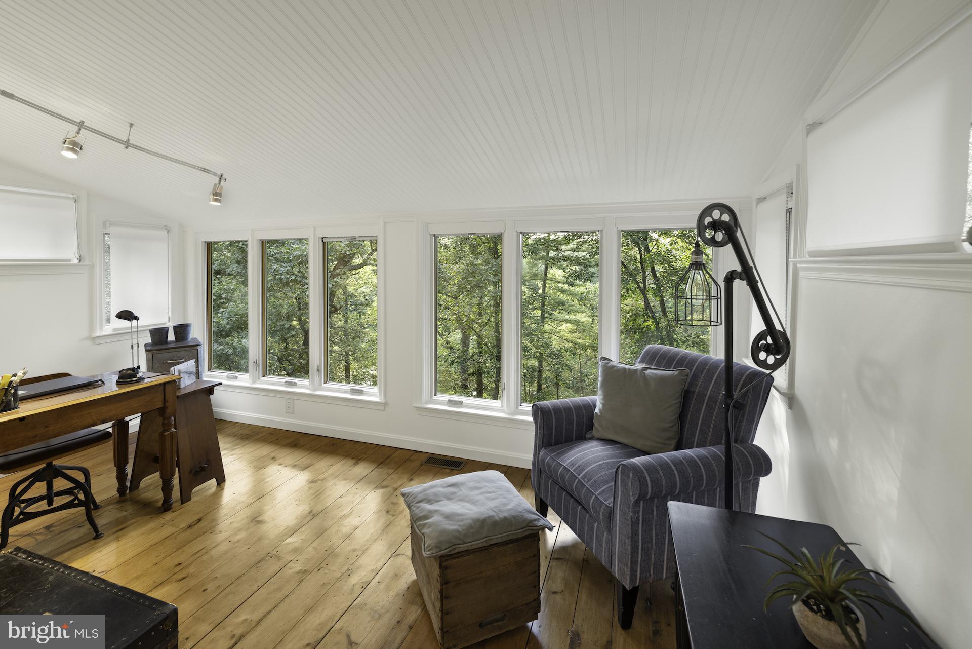 229 Boy Scout Road New Oxford, PA 17350 - Photo 23 of 73 a living room with furniture and a large window
