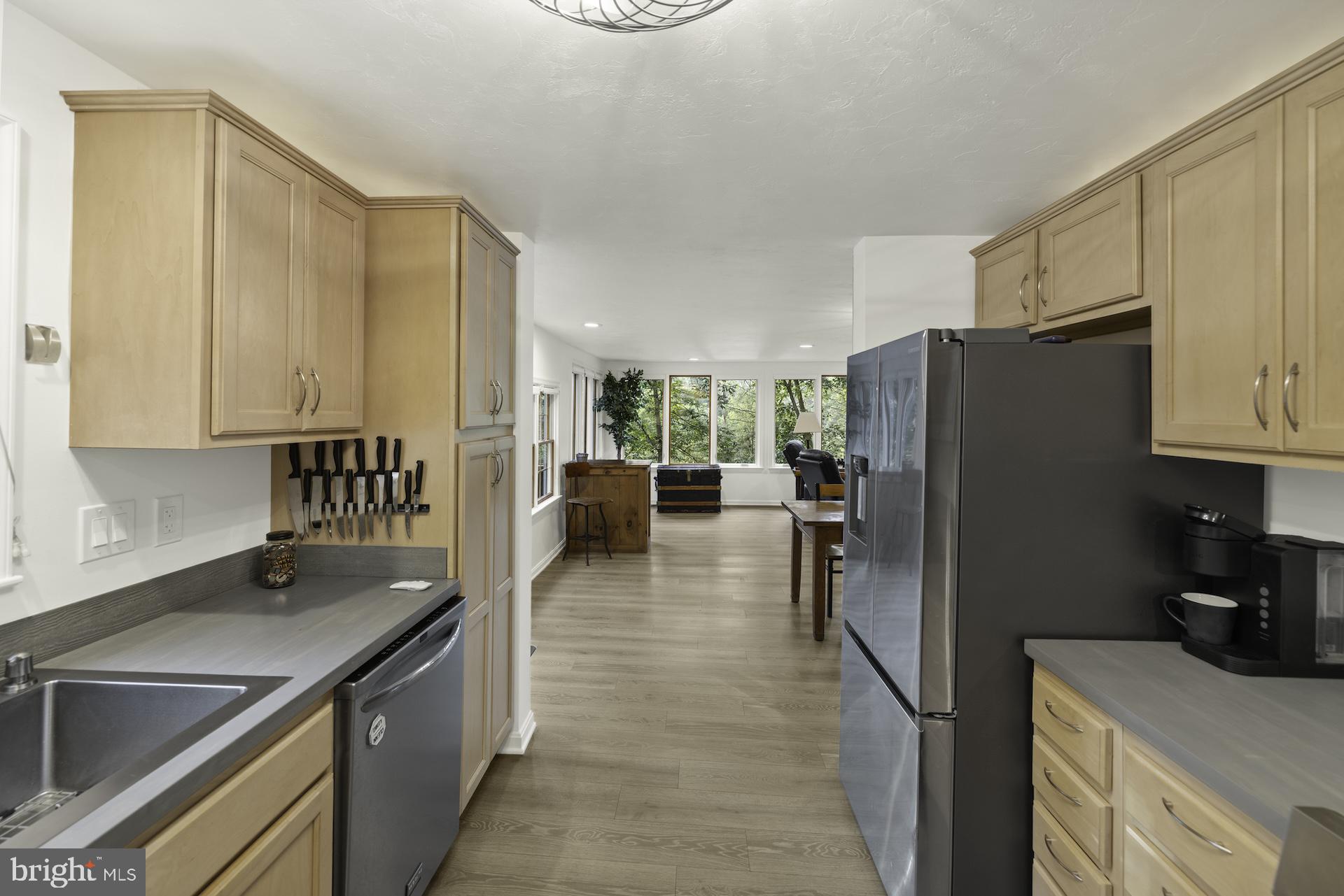 229 Boy Scout Road New Oxford, PA 17350 - Photo 8 of 73 a kitchen with a refrigerator and a sink