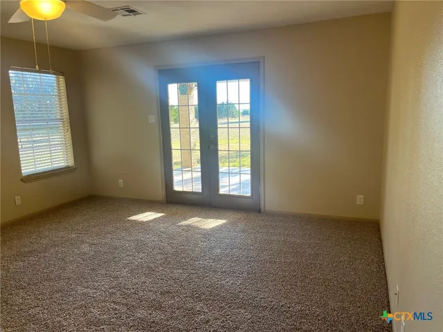 a bathroom with a toilet and a sink