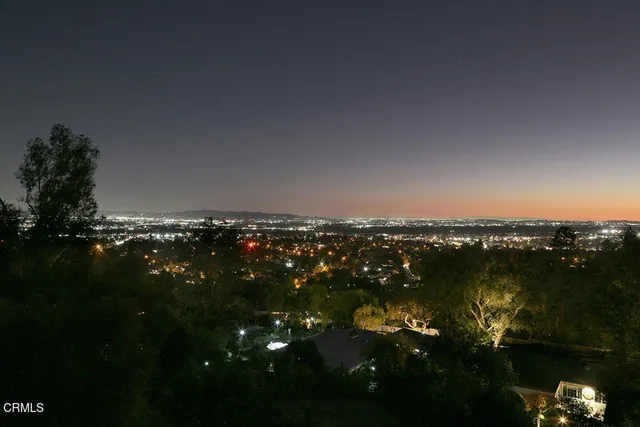 a view of a lake with a city