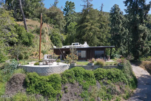 a view of a house with fire pit
