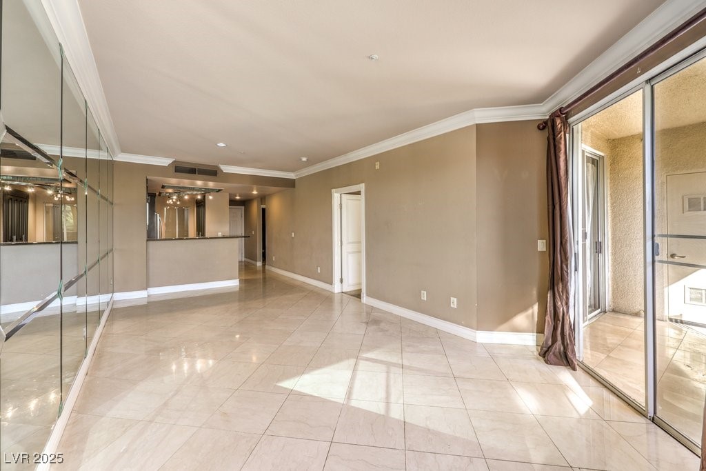 270 East Flamingo Road, Unit 115 Las Vegas, NV 89169 - Photo 14 of 29 Unfurnished room featuring ornamental molding and recessed lighting