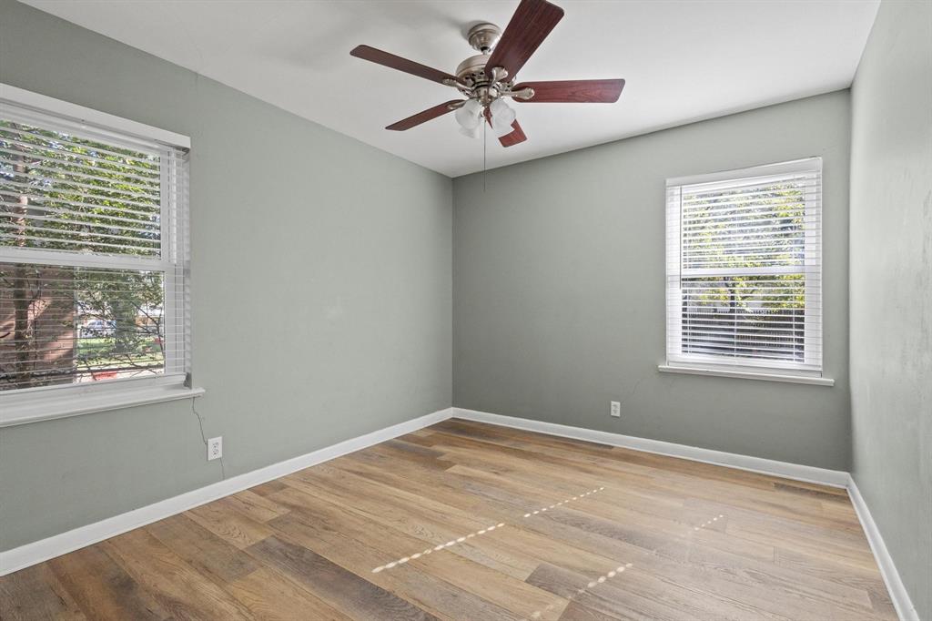1704 West Birge Street Sherman, TX 75092 - Photo 14 of 23 a view of an empty room with a window