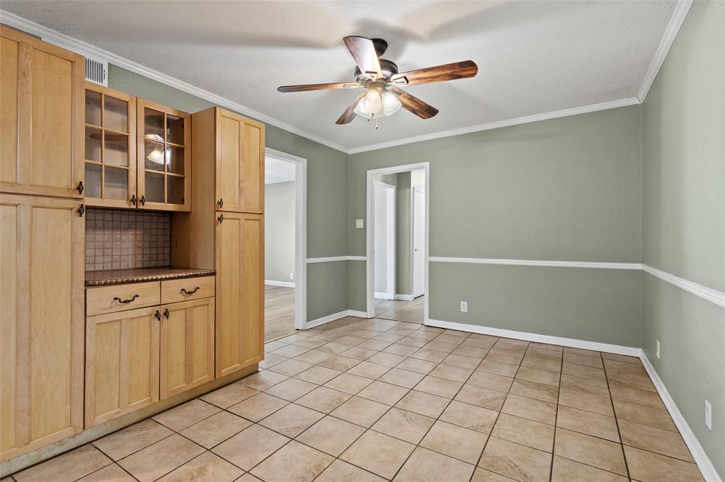 1704 West Birge Street Sherman, TX 75092 - Photo 4 of 23 a view of a kitchen with cabinet and entryway