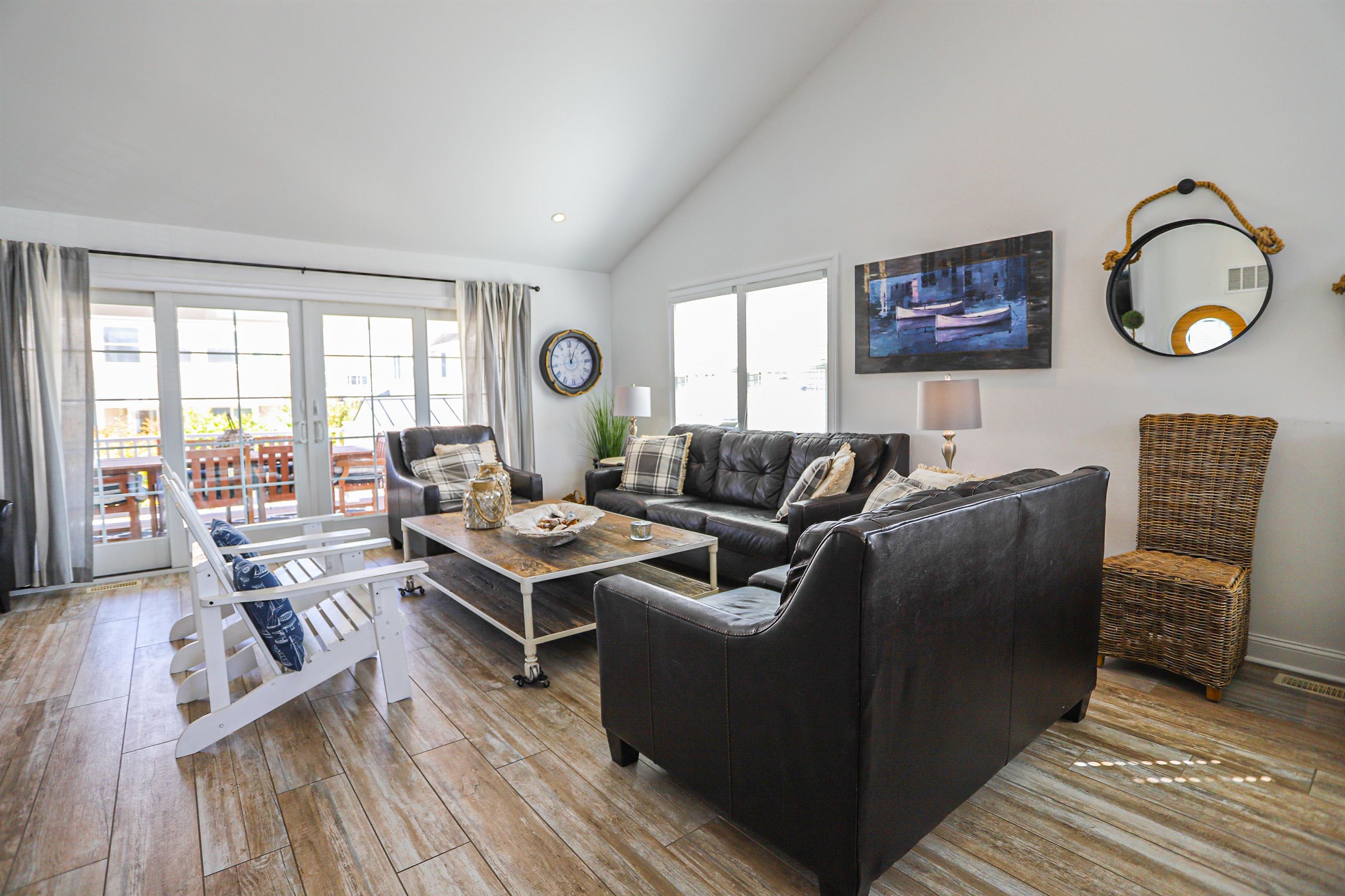 285 78th Street Avalon, NJ 08202 - Photo 13 of 48 a living room with furniture a rug and a window
