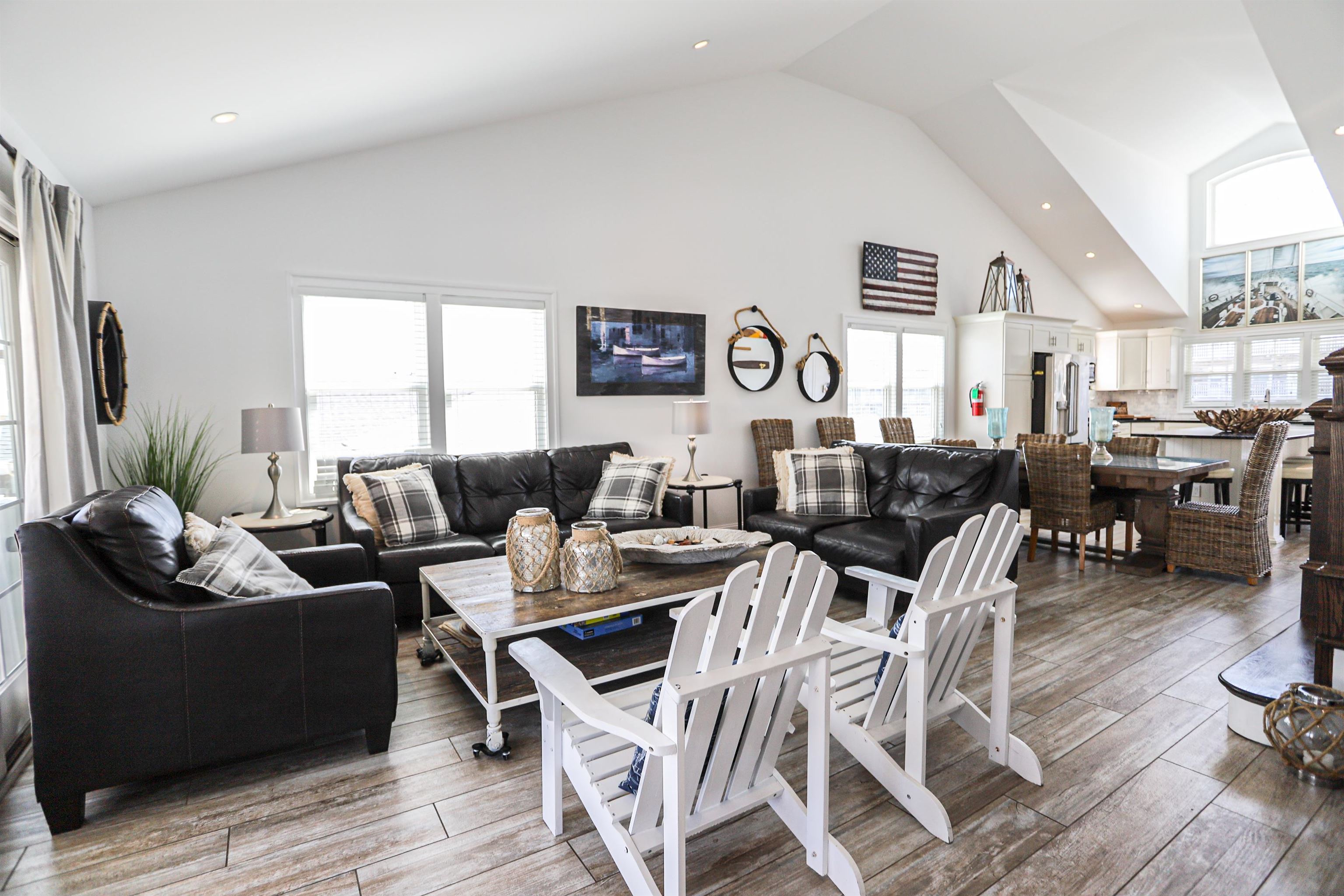 285 78th Street Avalon, NJ 08202 - Photo 16 of 48 a living room with lots of furniture and a wooden floor