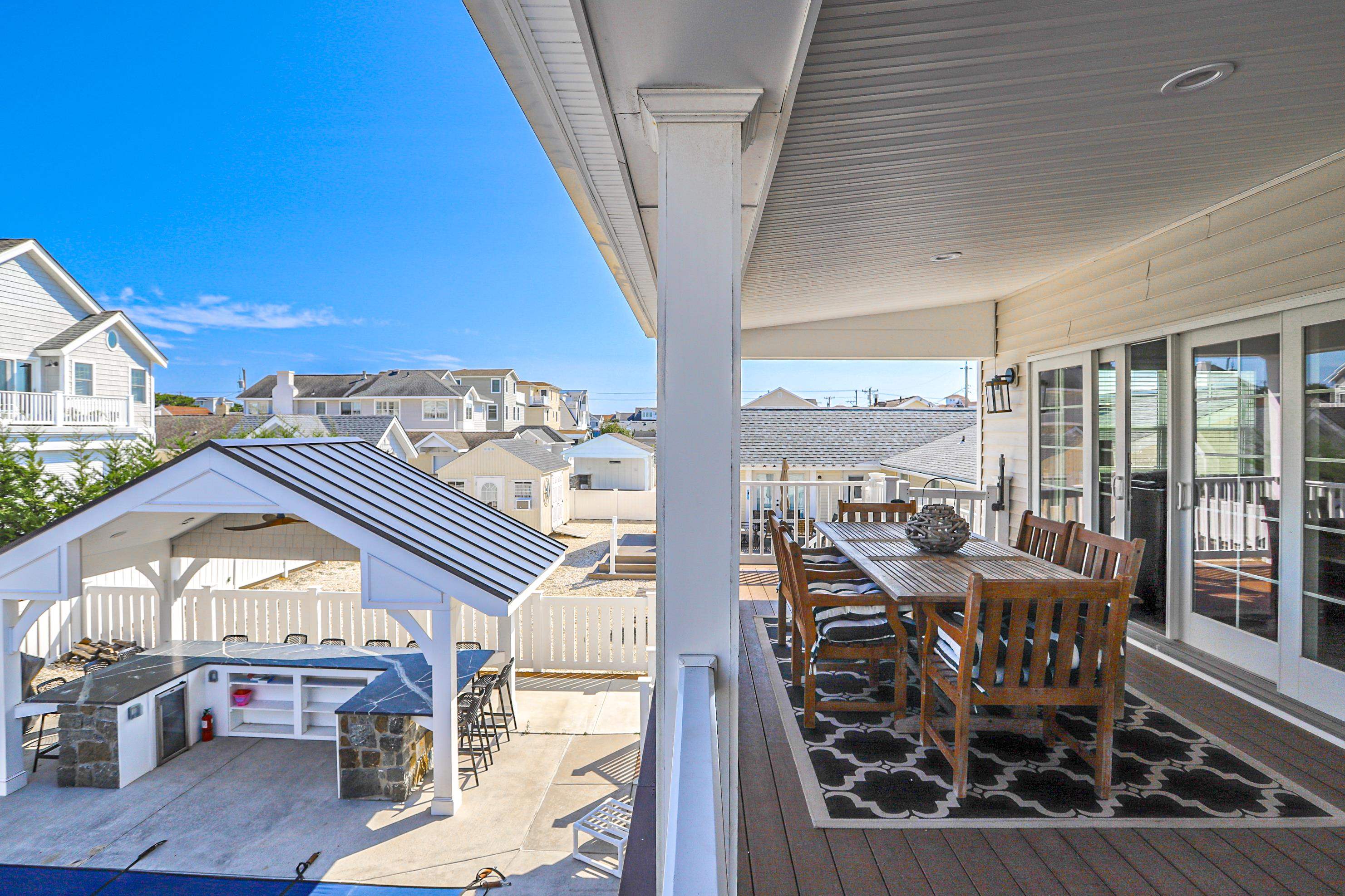 285 78th Street Avalon, NJ 08202 - Photo 20 of 48 a view of a balcony with chairs