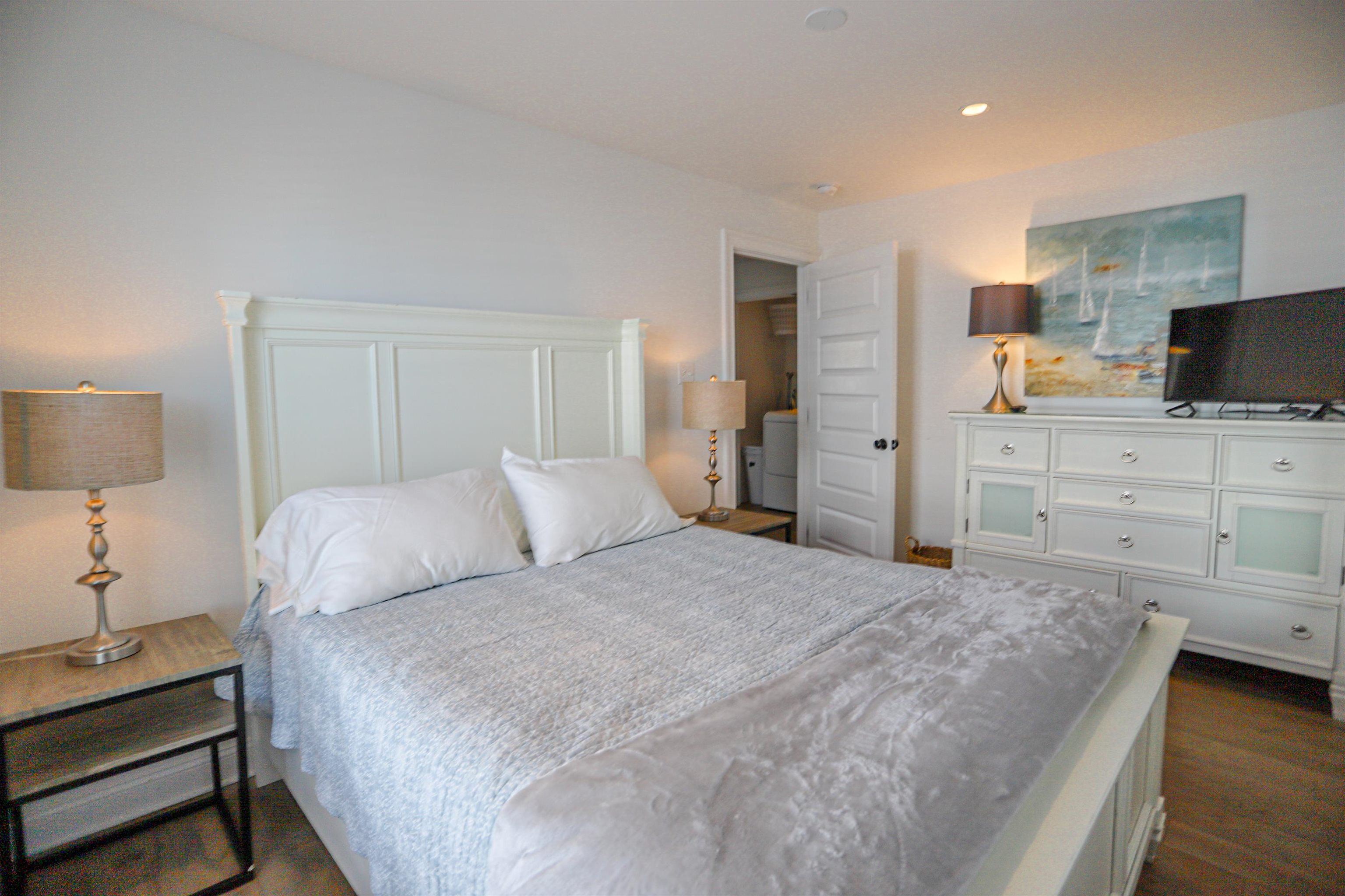 285 78th Street Avalon, NJ 08202 - Photo 23 of 48 a bed room with a bed and furniture