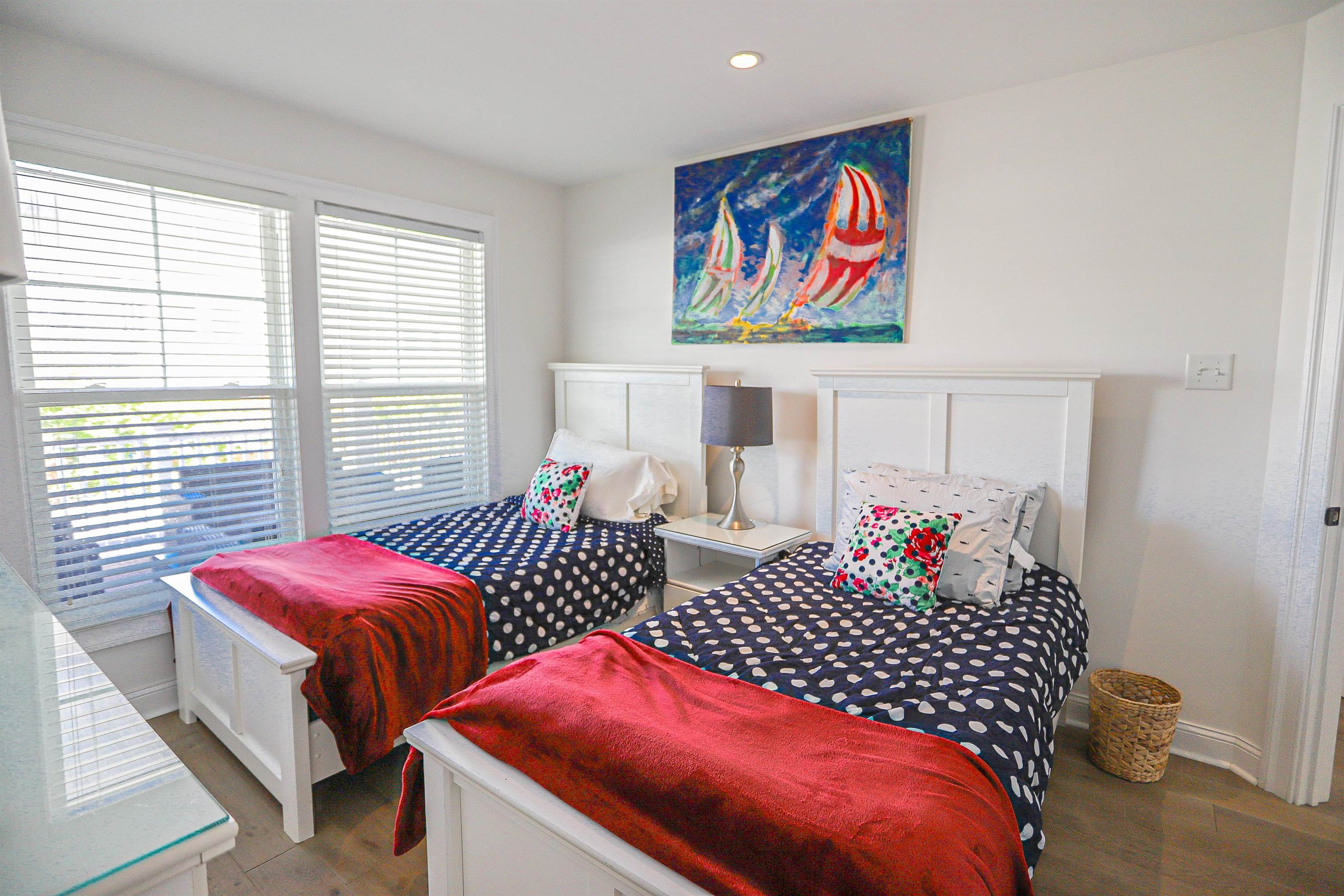 285 78th Street Avalon, NJ 08202 - Photo 25 of 48 a bedroom with two beds and a window