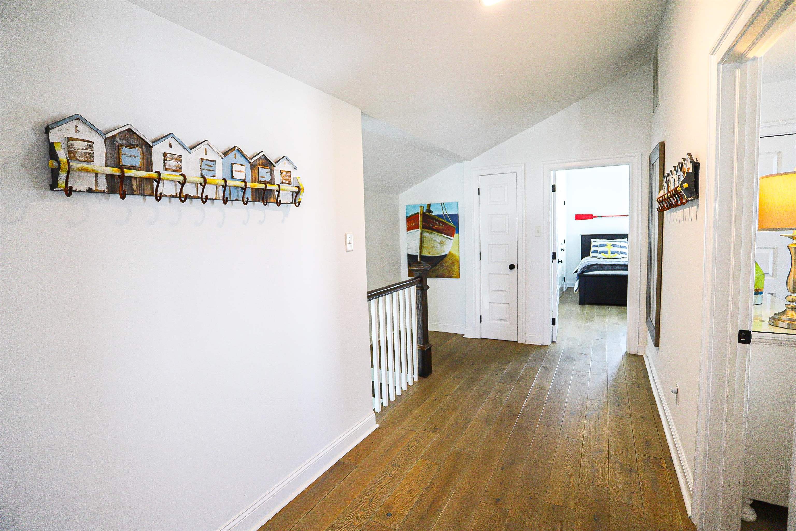 285 78th Street Avalon, NJ 08202 - Photo 32 of 48 a view of a hallway with wooden floor