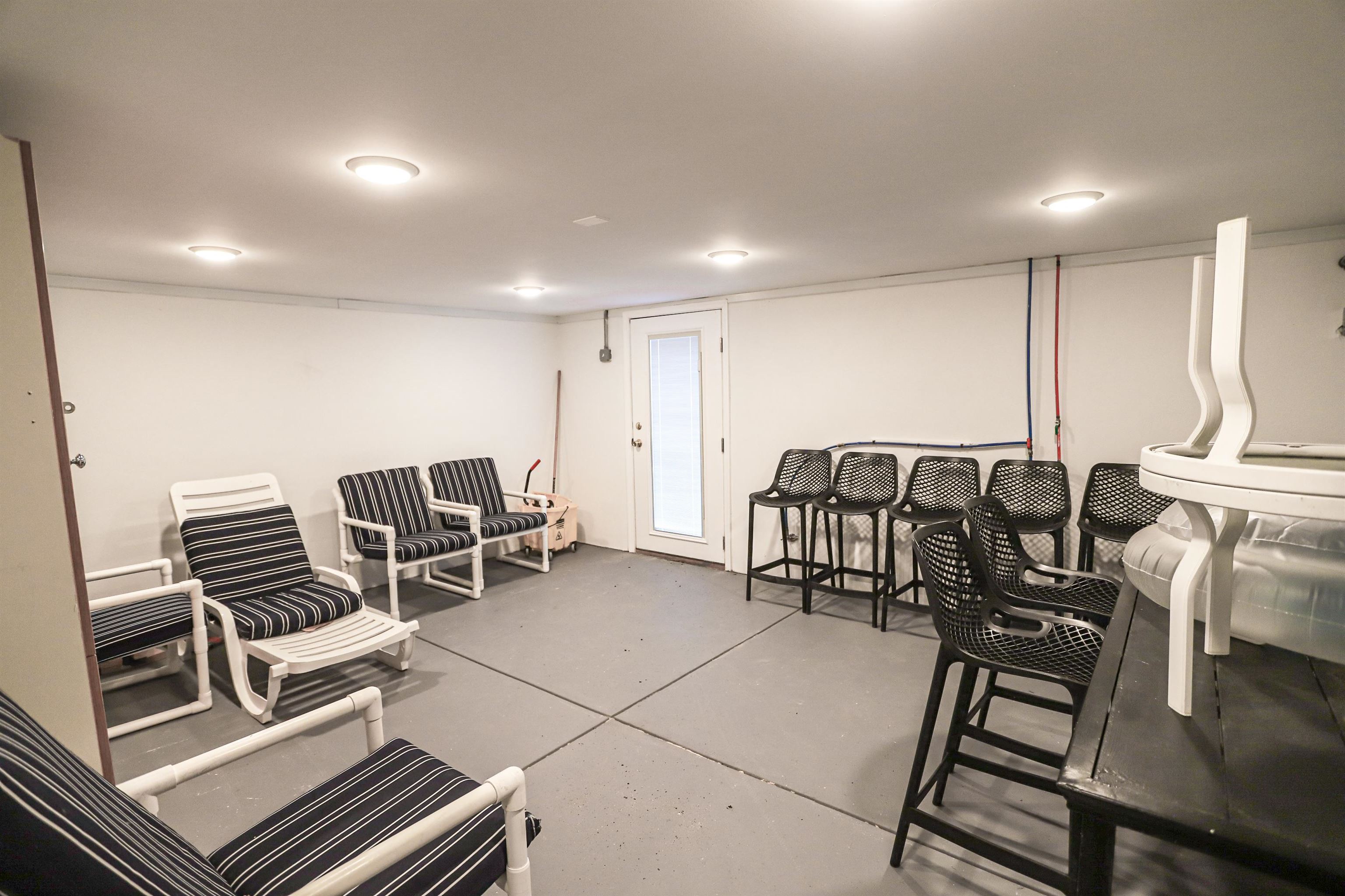 285 78th Street Avalon, NJ 08202 - Photo 37 of 48 a view of a room with chairs and musical instruments
