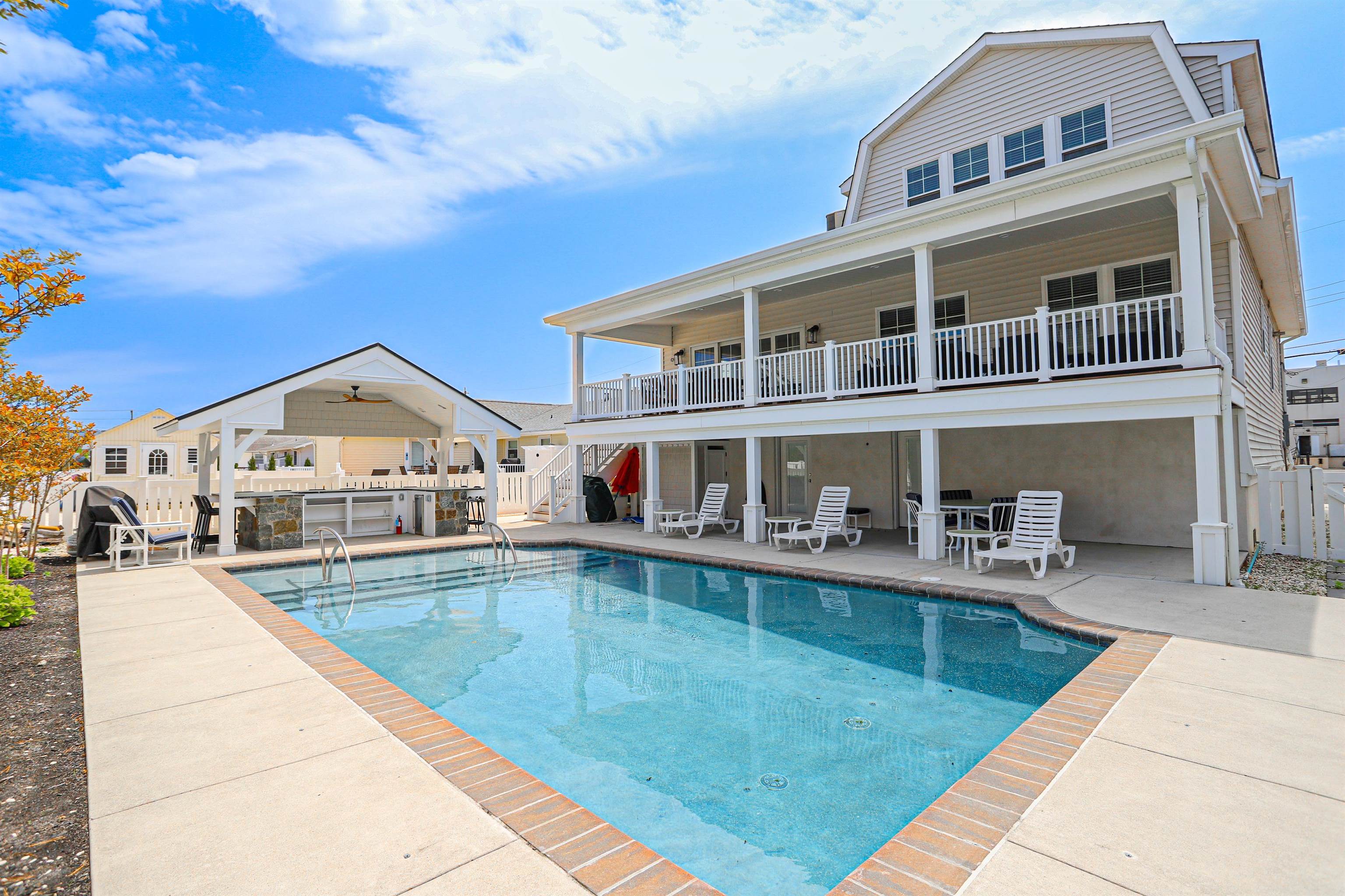 285 78th Street Avalon, NJ 08202 - Photo 39 of 48 a large pool with outdoor seating