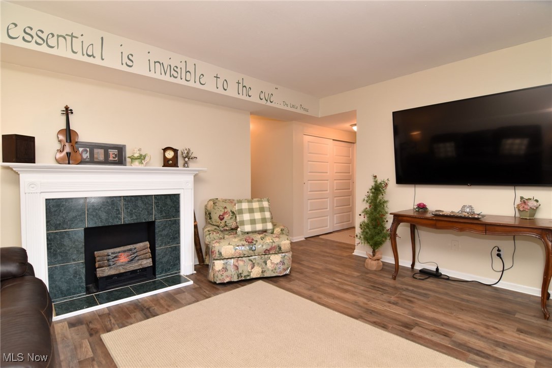 1105 Canyon View Road, Unit 602 Northfield, OH 44067 - Photo 15 of 31 Living room featuring a fireplace