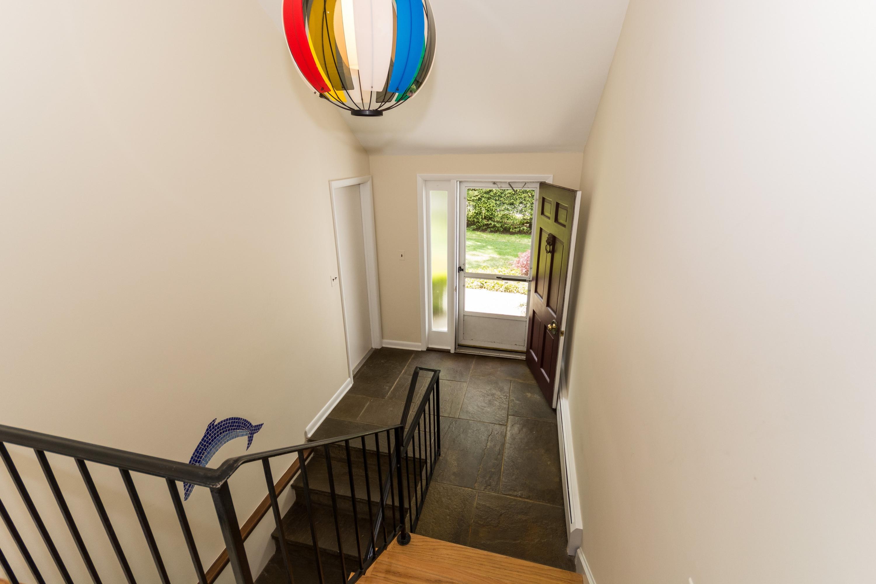 145 Middlesex Road Darien, CT 06820 - Photo 15 of 23 a view of entryway with wooden floor