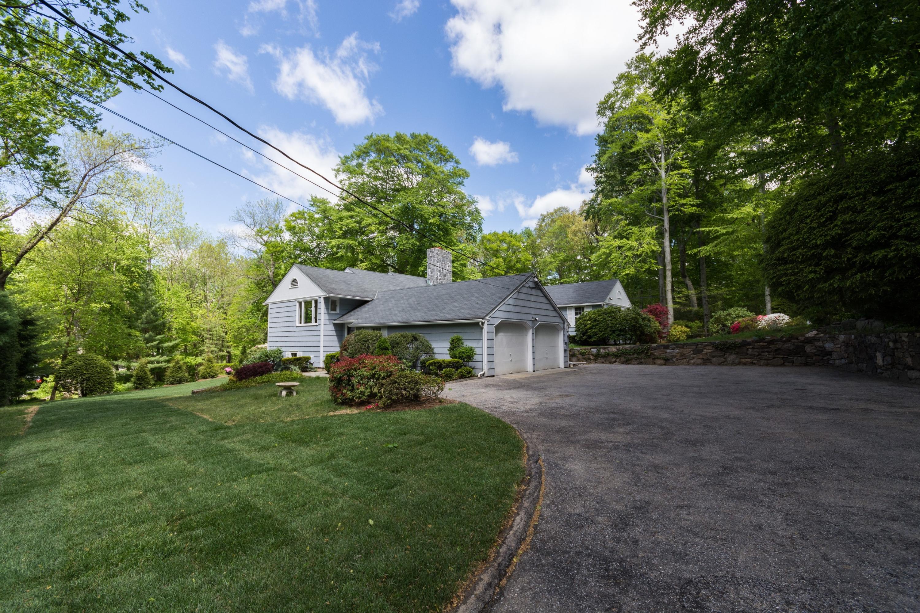 145 Middlesex Road Darien, CT 06820 - Photo 23 of 23 a view of a house with a yard
