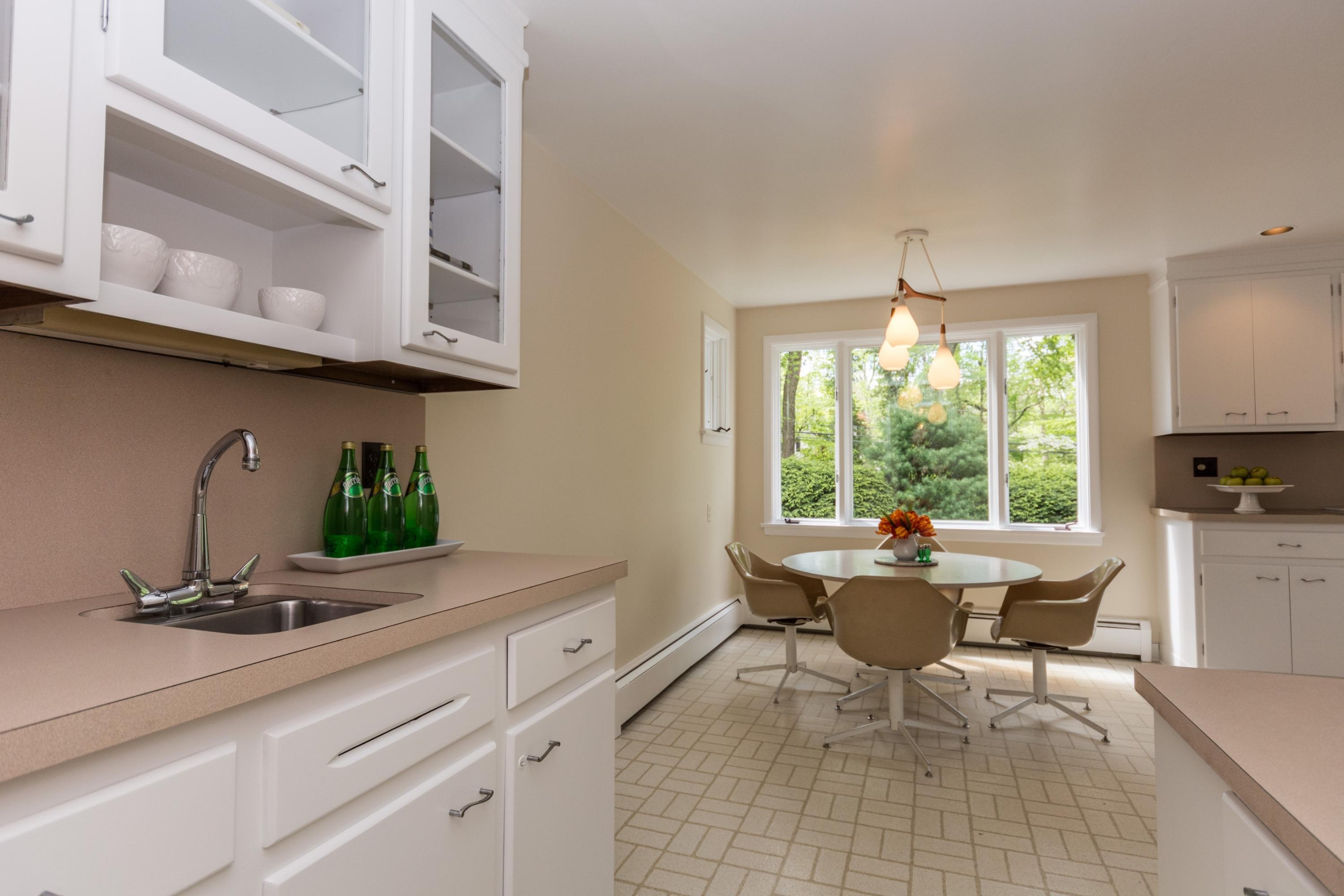 145 Middlesex Road Darien, CT 06820 - Photo 10 of 23 a living room with furniture and a large window