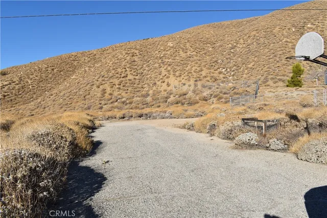 a view of a town with mountains in the background