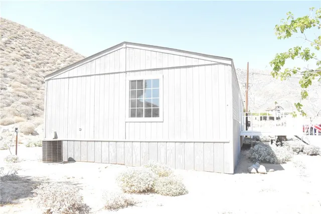 a large white window in a white room