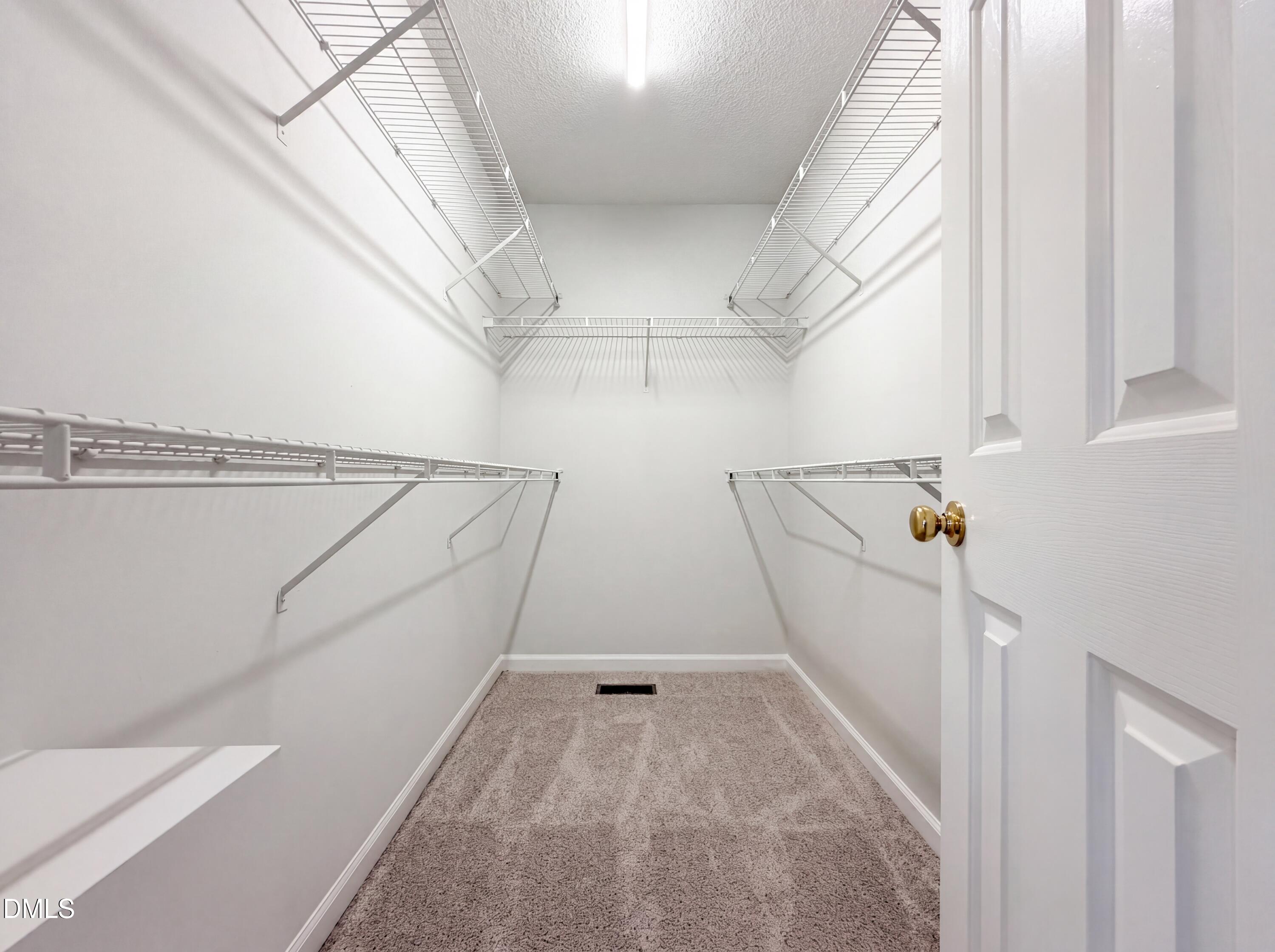 765 Trebor Drive Garner, NC 27529 - Photo 14 of 27 a view of a room with racks on the wall