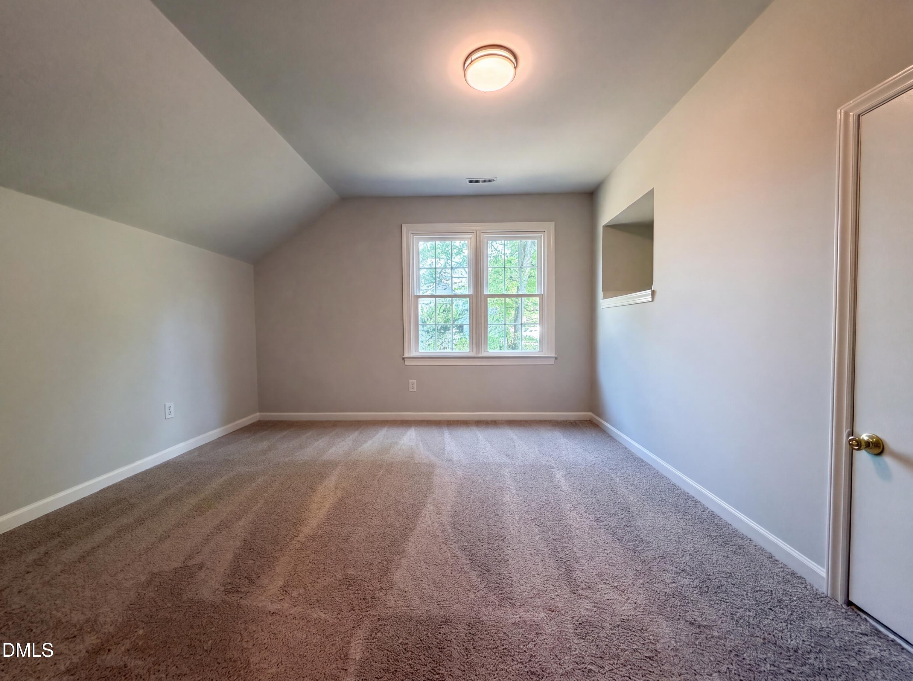 765 Trebor Drive Garner, NC 27529 - Photo 18 of 27 an empty room with a window