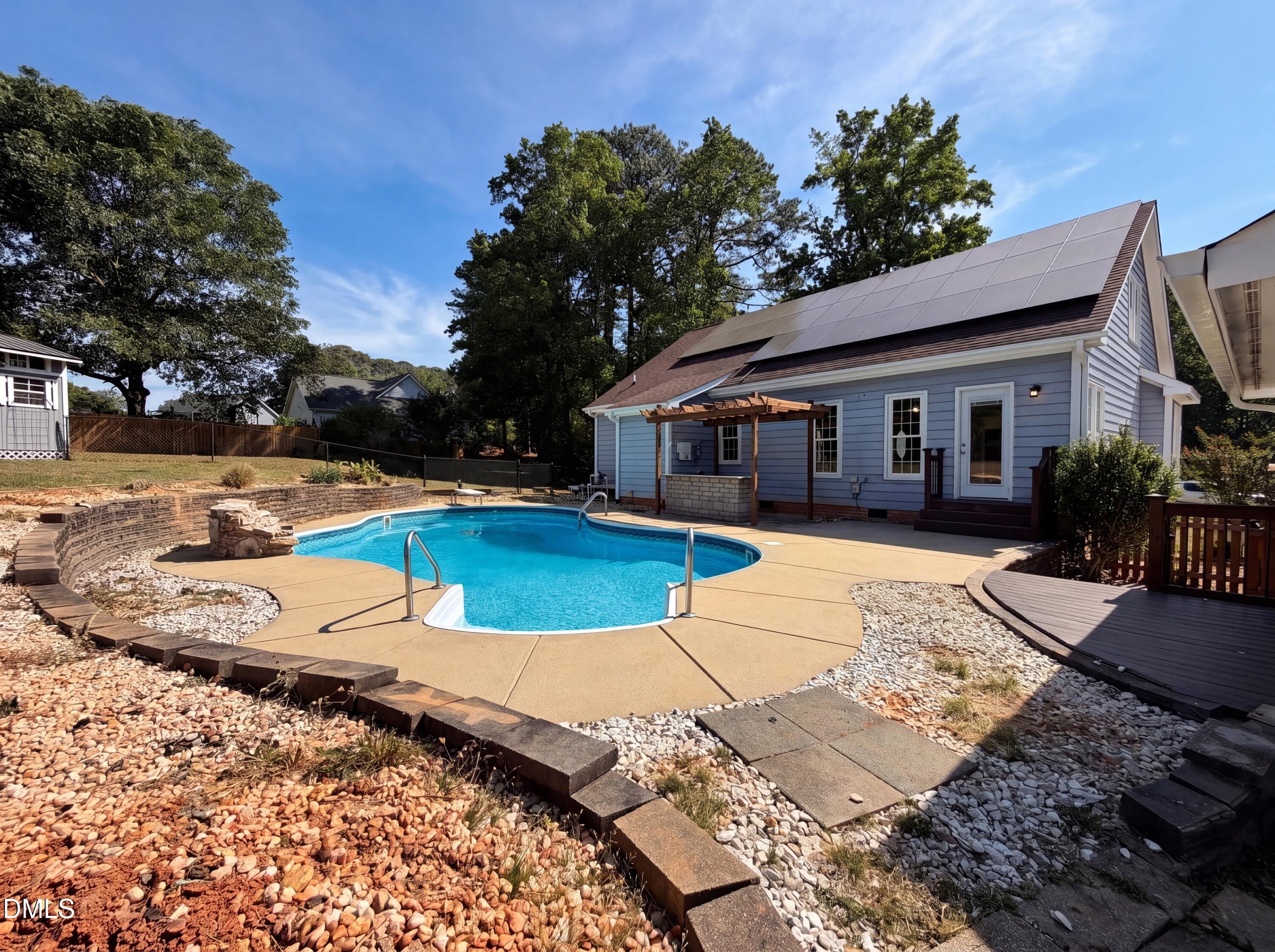 765 Trebor Drive Garner, NC 27529 - Photo 24 of 27 a view of a house with yard and sitting area