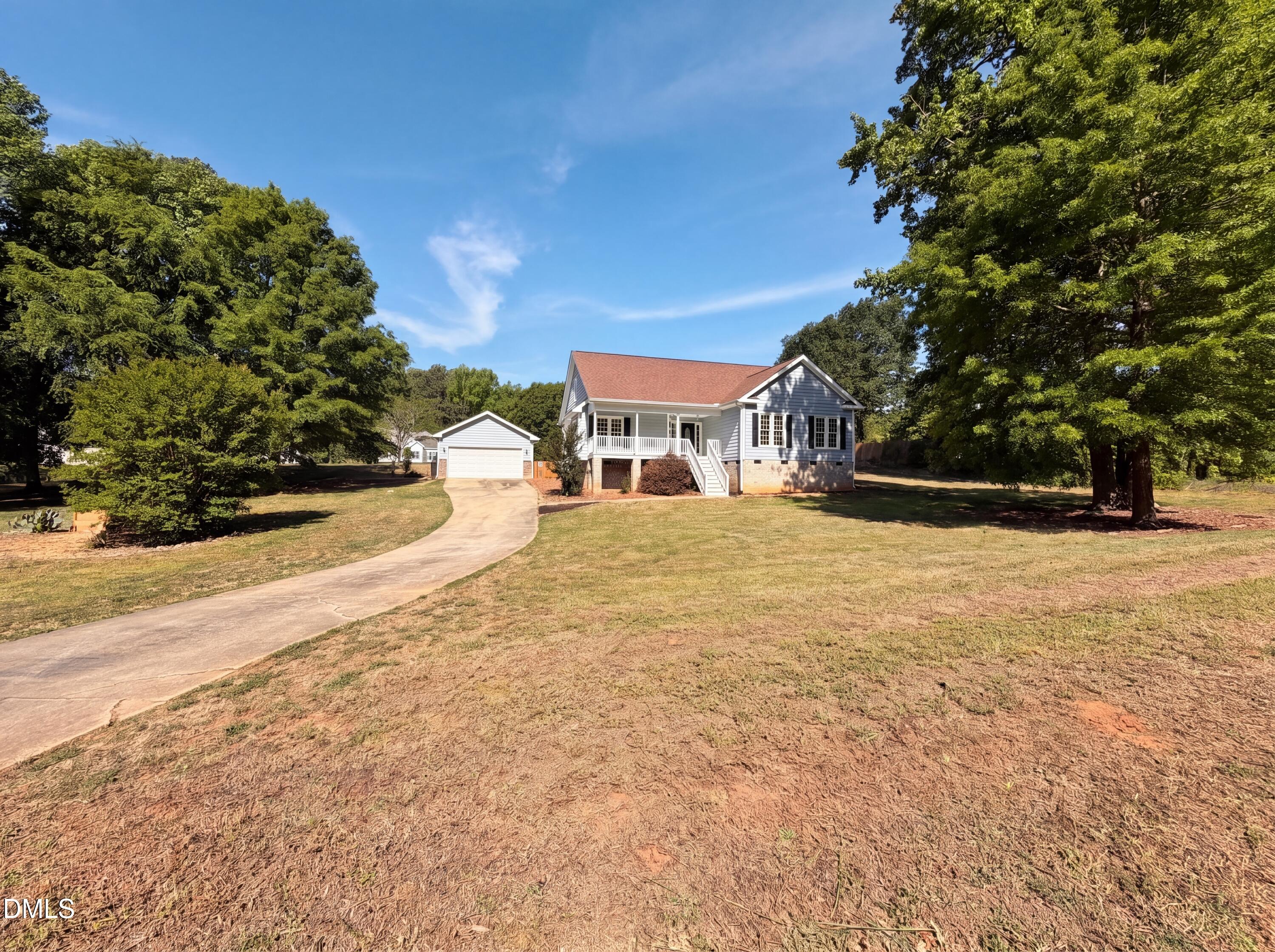 765 Trebor Drive Garner, NC 27529 - Photo 7 of 27 a view of outdoor space with deck and tree
