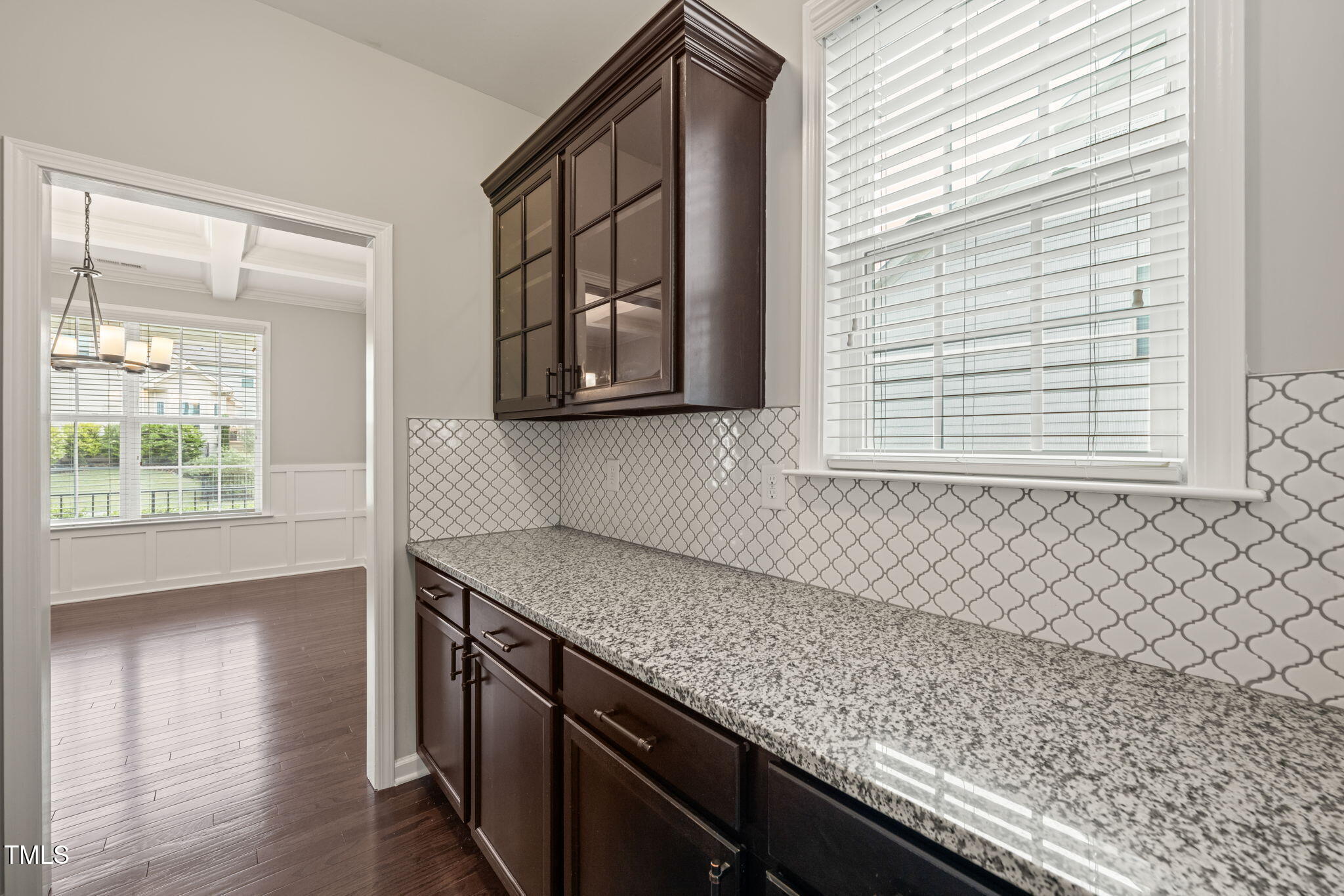 5011 Peachtree Town Lane Knightdale, NC 27545 - Photo 11 of 47 an empty room with wooden floor and window