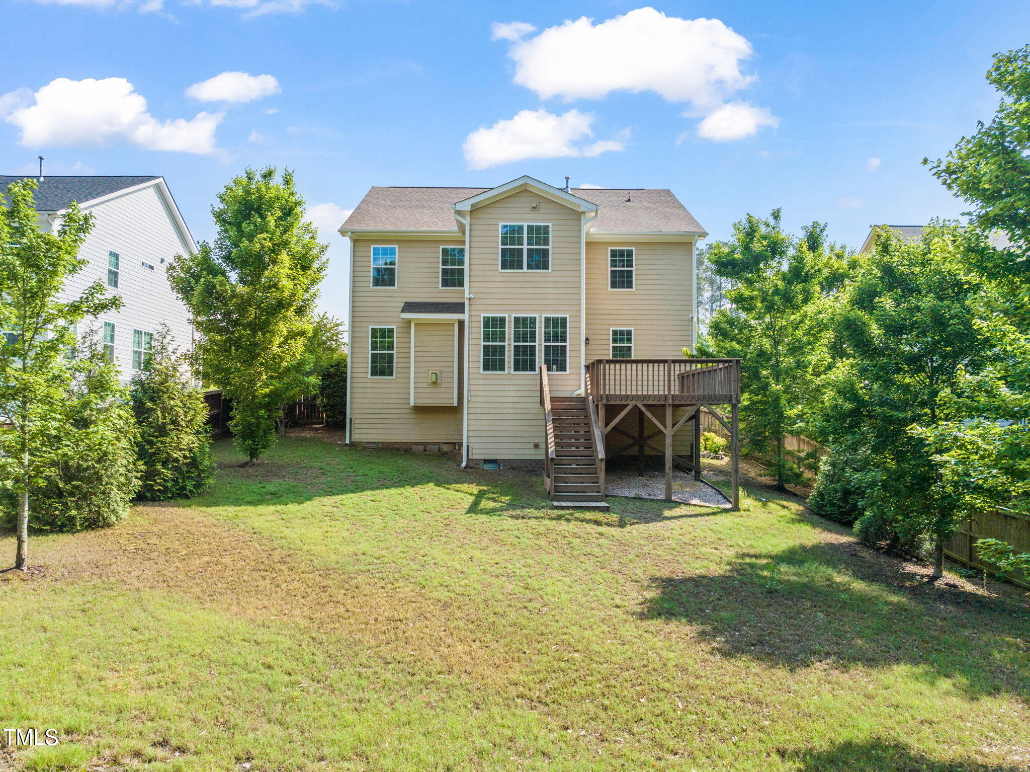 5011 Peachtree Town Lane Knightdale, NC 27545 - Photo 42 of 47 a view of a house with a yard