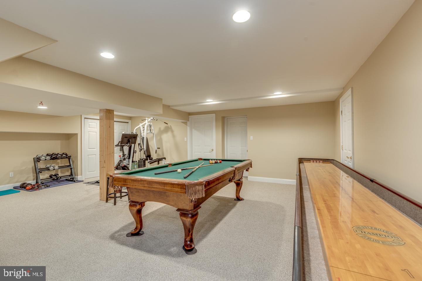 4 Bennington Drive Medford, NJ 08055 - Photo 31 of 44 Basement game and workout areas