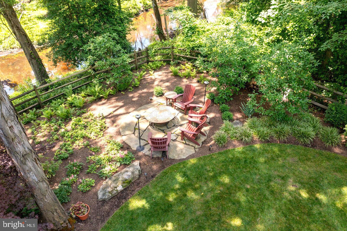 4 Bennington Drive Medford, NJ 08055 - Photo 4 of 44 Bluestone patio with view of the stream