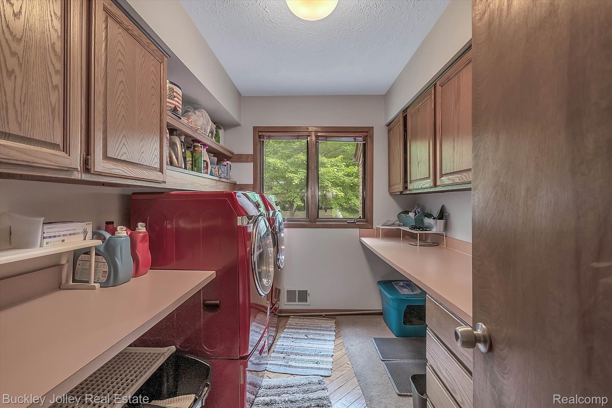 7926 Winans Lake Road Brighton, MI 48116 - Photo 28 of 36 Laundry Room has Fantastic Folding Counters.jpg