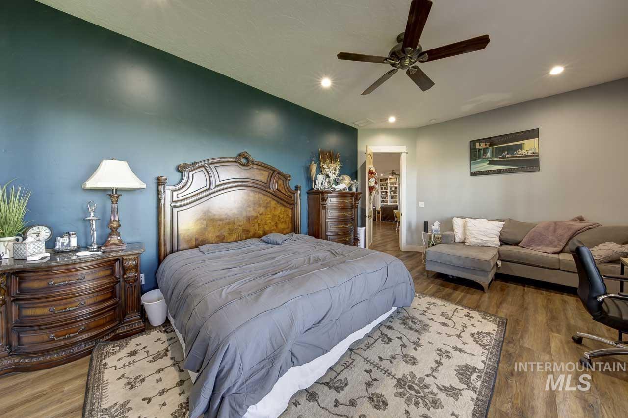 415 North Locust Grove Road Kuna, ID 83634 - Photo 29 of 49 Bedroom with wood finished floors, a ceiling fan, and recessed lighting