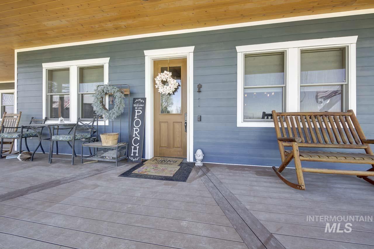 415 North Locust Grove Road Kuna, ID 83634 - Photo 8 of 49 Property entrance featuring a porch