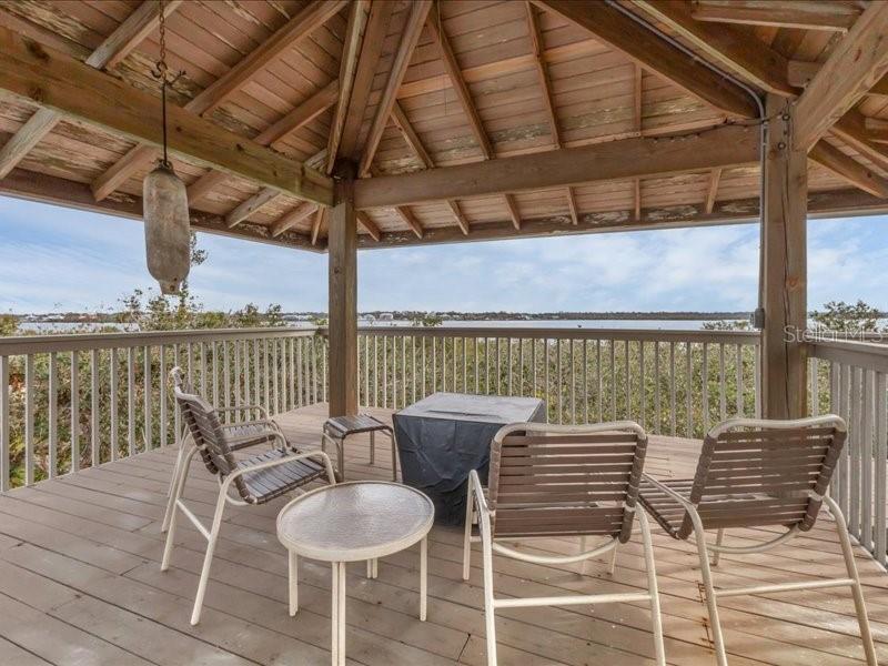 7475 Manasota Key Road Englewood, FL 34223 - Photo 27 of 79 a view of a chairs and table on the roof deck