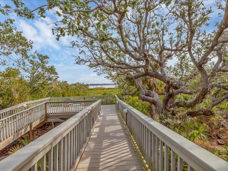 7475 Manasota Key Road Englewood, FL 34223 - Photo 47 of 79 a view of a balcony with wooden deck