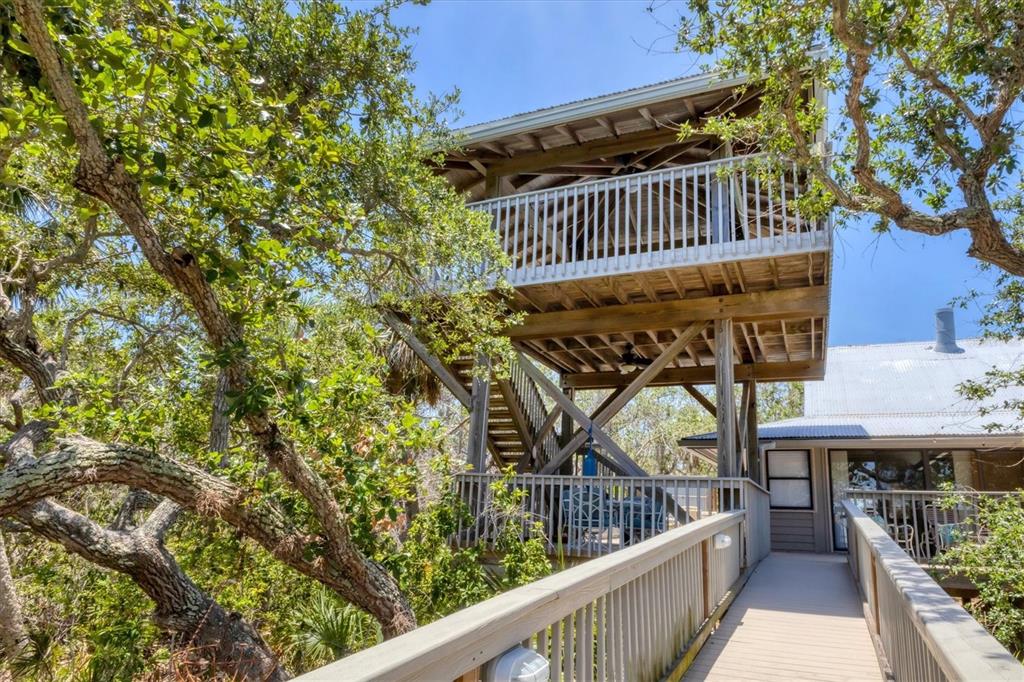 7475 Manasota Key Road Englewood, FL 34223 - Photo 6 of 79 a view of balcony with small garden