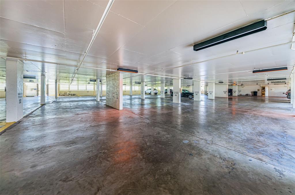14950 Gulf Boulevard, Unit 1206 Madeira Beach, FL 33708 - Photo 35 of 69 a view of empty room with lots of wooden floor