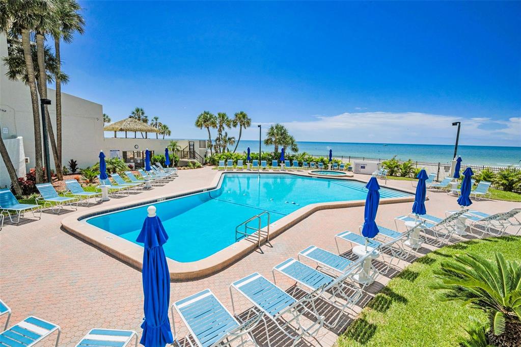 14950 Gulf Boulevard, Unit 1206 Madeira Beach, FL 33708 - Photo 54 of 69 a view of a swimming pool with a lake view