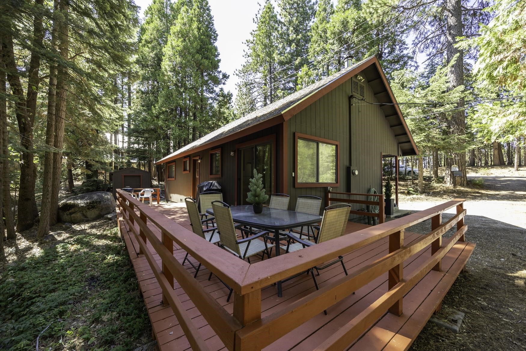 41080 Putt Road Emigrant Gap, CA 95715 - Photo 14 of 21 a view of backyard with deck and outdoor seating