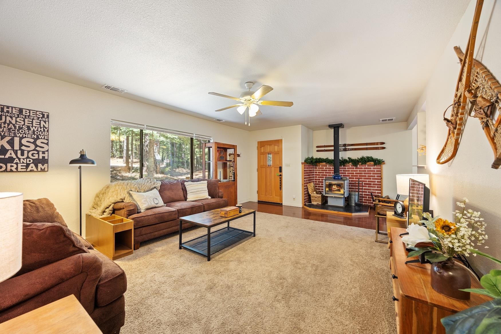41080 Putt Road Emigrant Gap, CA 95715 - Photo 3 of 21 a living room with furniture and a chandelier