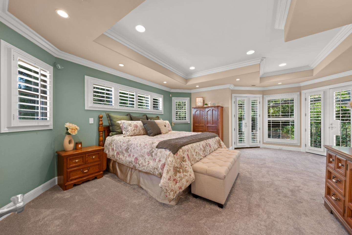 10495 Scenic Boulevard Cupertino, CA 95014 - Photo 16 of 30 a spacious bedroom with a bed and a couch