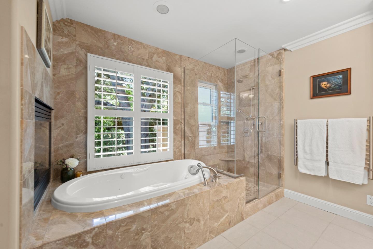 10495 Scenic Boulevard Cupertino, CA 95014 - Photo 17 of 30 a bathroom with a bathtub and a shower