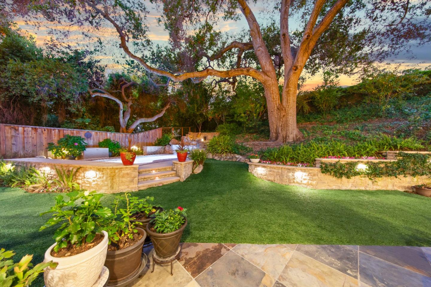 10495 Scenic Boulevard Cupertino, CA 95014 - Photo 25 of 30 a view of a garden with a fountain
