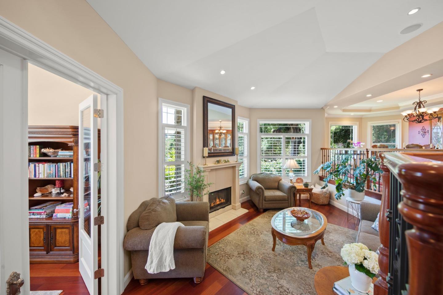 10495 Scenic Boulevard Cupertino, CA 95014 - Photo 4 of 30 a living room with furniture and a wooden floor