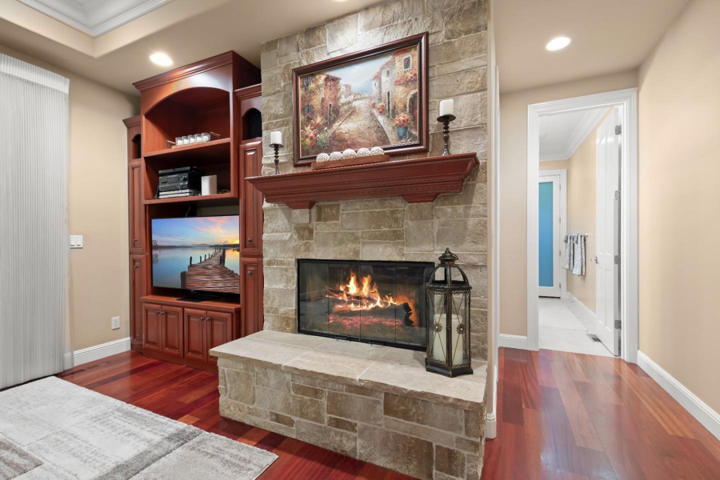 10495 Scenic Boulevard Cupertino, CA 95014 - Photo 10 of 30 a living room with furniture and a fireplace