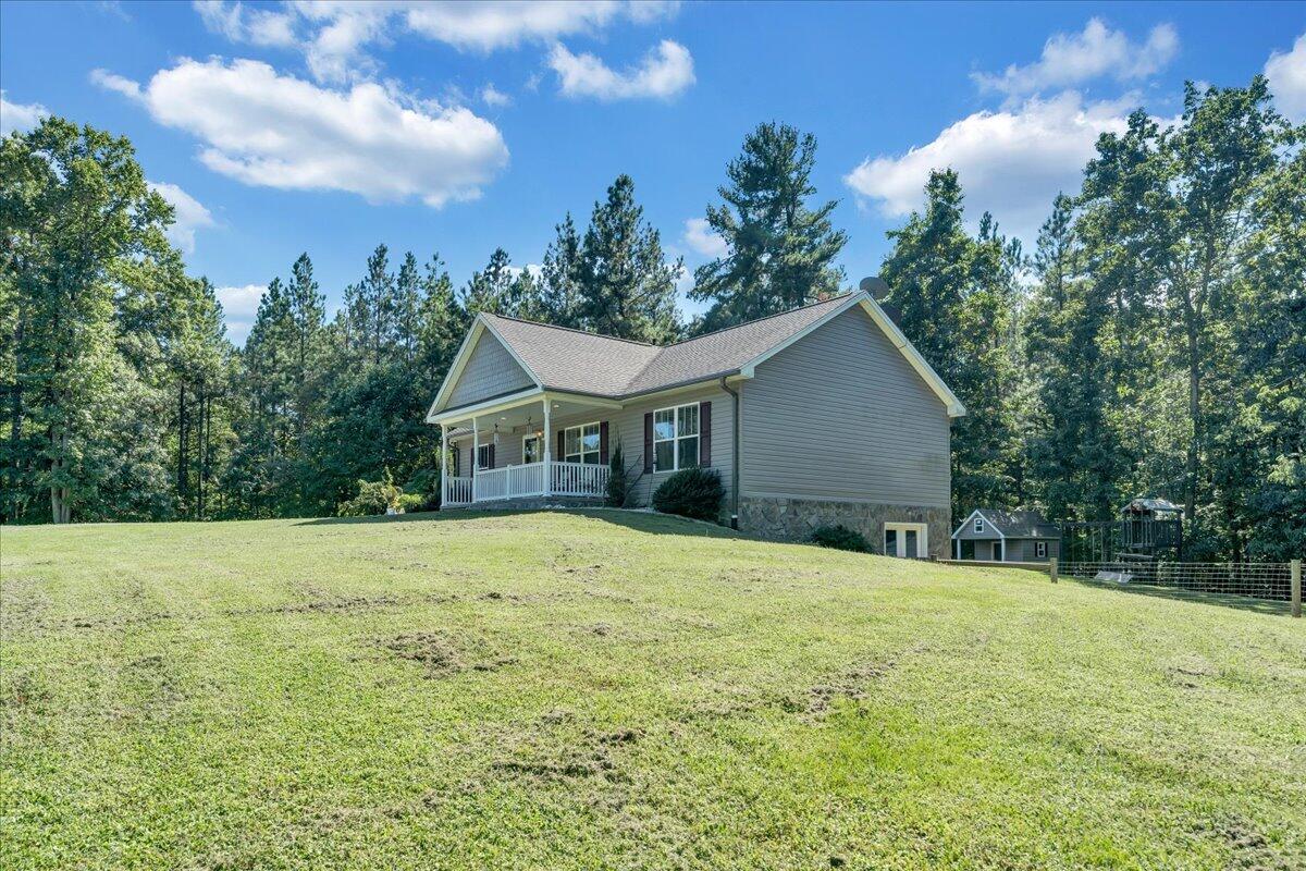 485 Foothills Road Callaway, VA 24067 - Photo 3 of 39 a house with trees in the background