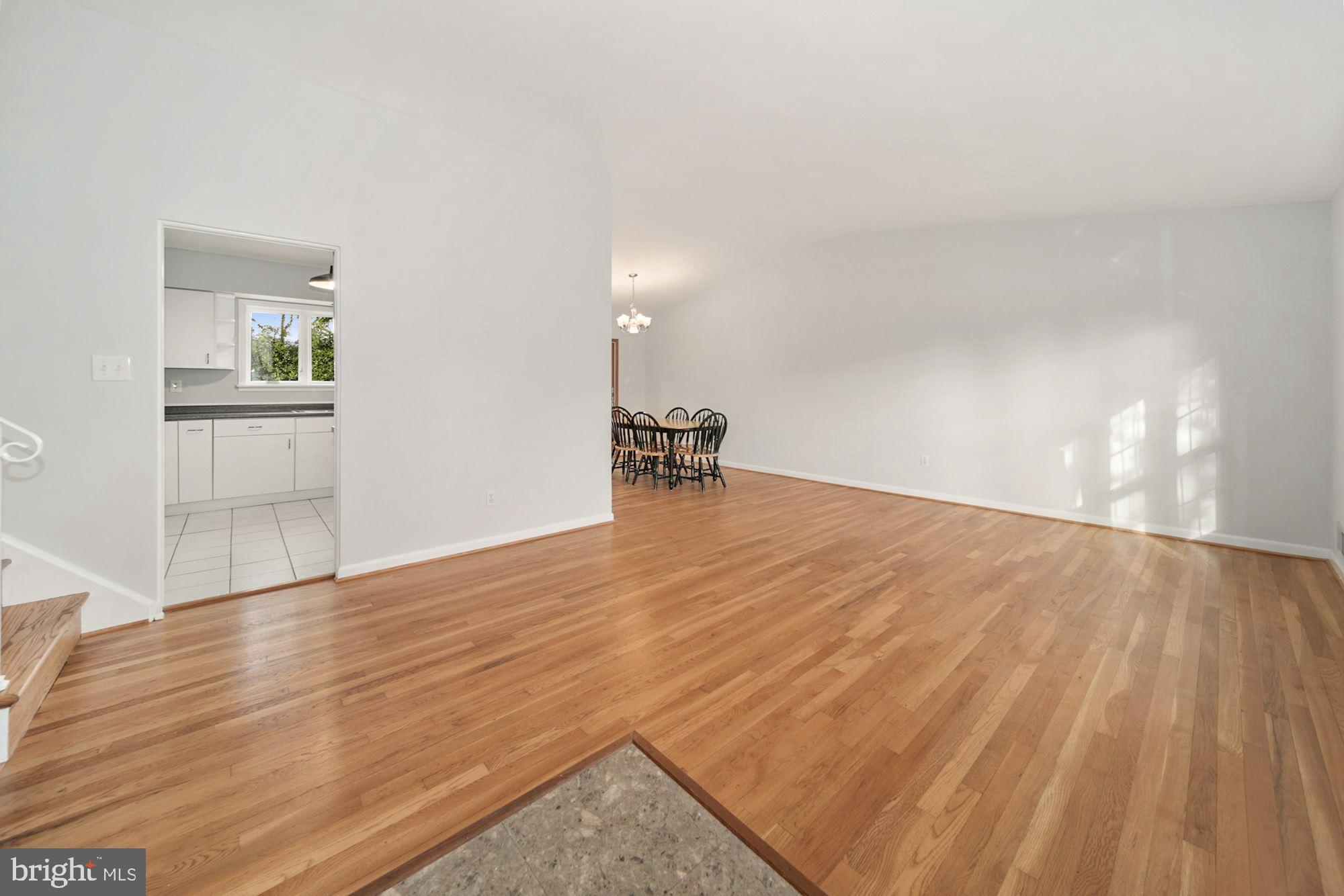 13124 Fernedge Road Silver Spring, MD 20906 - Photo 4 of 31 Living Room view into Dining Room & Kitchen.