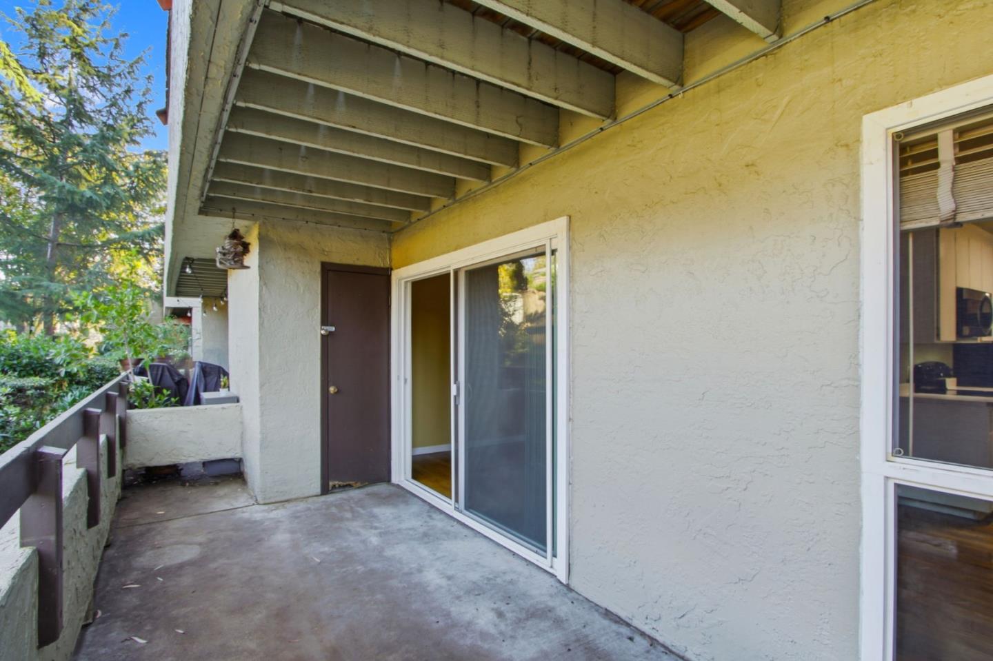 305 Tradewinds Drive, Unit 5 San Jose, CA 95123 - Photo 14 of 24 a view of entryway with a front door and wooden walls
