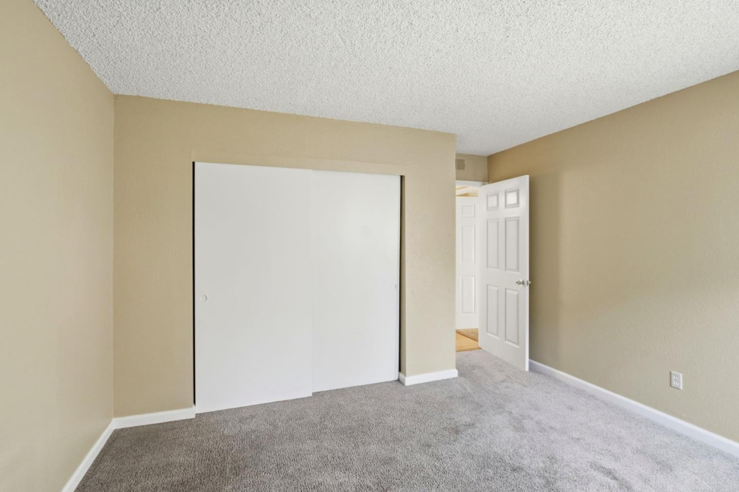 305 Tradewinds Drive, Unit 5 San Jose, CA 95123 - Photo 8 of 24 a view of an empty room and closet area